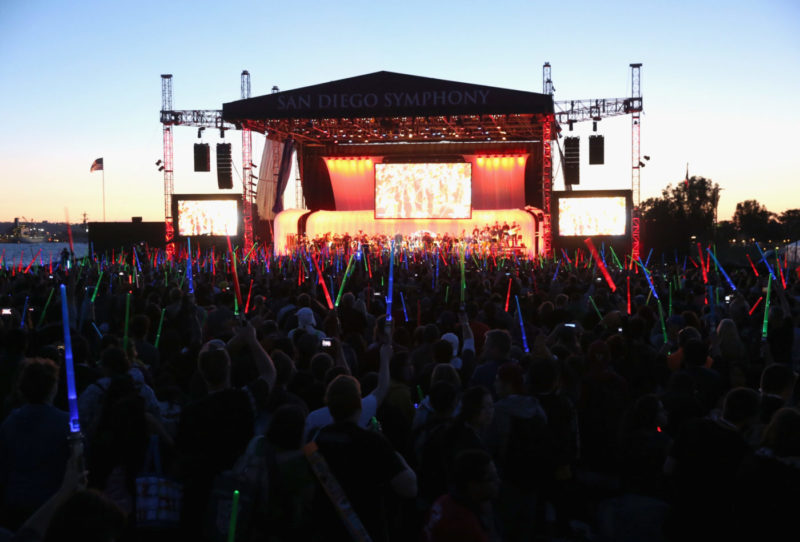 SAN DIEGO, CA - JULY 10: Following the `Star Wars` Hall H presentation at Comic-Con International 2015 at the San Diego Convention Center in San Diego, Calif., the audience of more than 6000 fans enjoyed a surprise `Star Wars` Fan Concert performed by the San Diego Symphony, featuring the classic `Star Wars` music of composer John Williams, at the Embarcadero Marina Park South on July 10, 2015 in San Diego, California. (Photo by Jesse Grant/Getty Images for Disney)