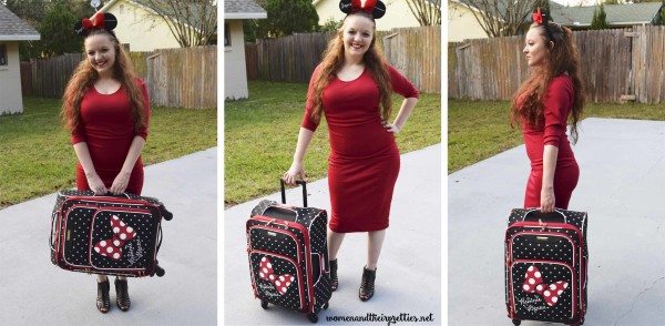 Holding American Tourister Luggage