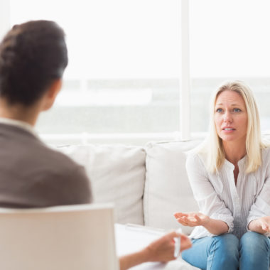 Woman asking questions to therapist
