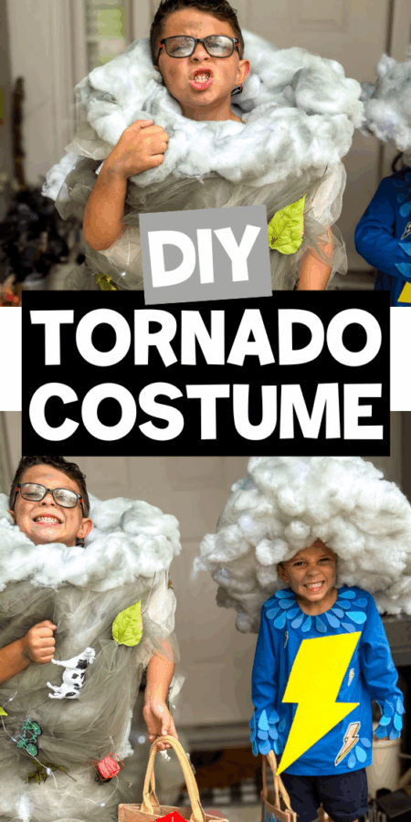 Two kids dressed as a tornado and a storm cloud, holding handmade prop houses, celebrating their DIY costumes.