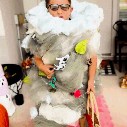 child spinning in diy tulle tornado costume
