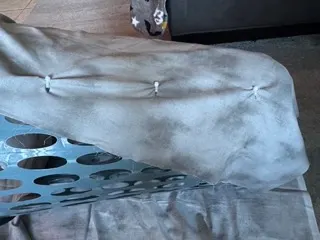 wrapping stormy fabric around laundry basket for homemade tornado costume