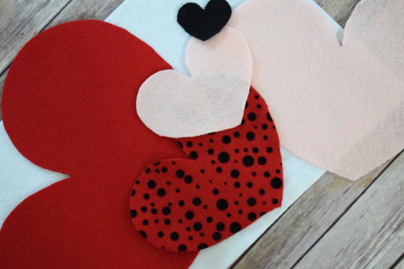 Cupid's Shot at Love is a DIY Valentine's Day game for kids (or adults) of any age to play! It's a cheap and easy to make Valentine's Day craft!