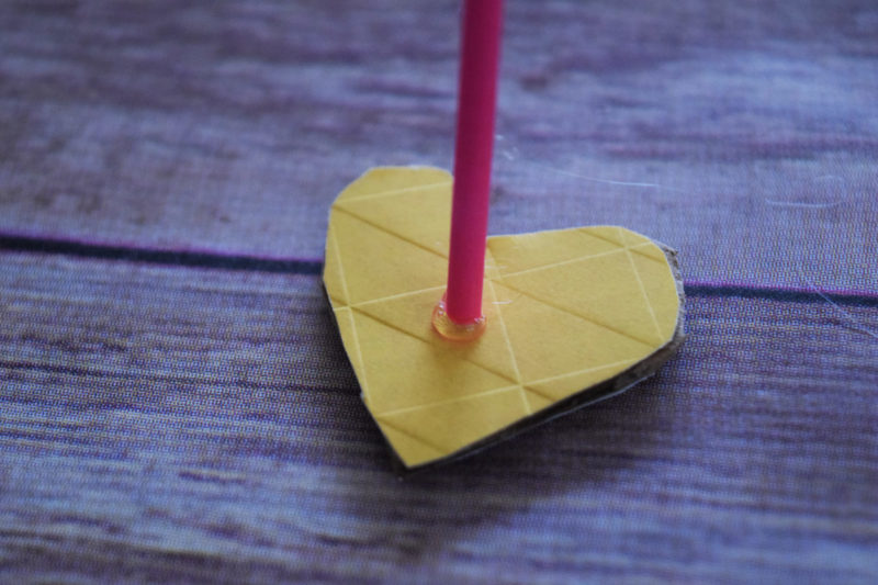 Cupid's Shot at Love is a DIY Valentine's Day game for kids (or adults) of any age to play! It's a cheap and easy to make Valentine's Day craft!