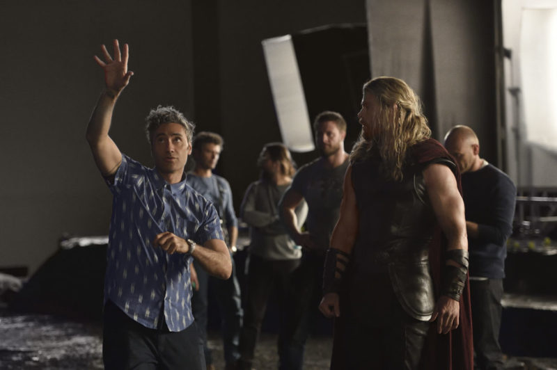 Thor: Ragnarok - (L-R) Director Taika Waititi and Chris Hemsworth. Photo by: Jasin Boland. ©2016 Marvel Studios.
