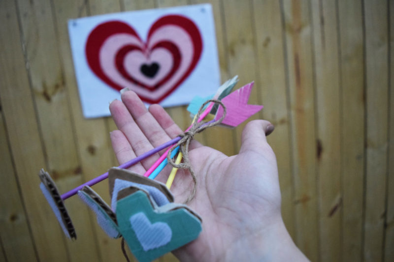 Cupid's Shot at Love is a DIY Valentine's Day game for kids (or adults) of any age to play! It's a cheap and easy to make Valentine's Day craft!